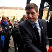 Rangers manager Steven Gerrard signs a Liverpool shirt upon arriving at Dens Park for a game against Dundee in December 2018