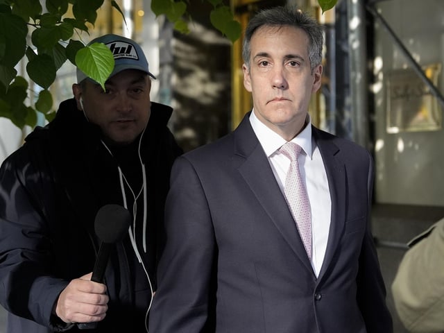 Michael Cohen leaves his apartment building on his way to Manhattan criminal court on Monday. Photo: AP Photo/Julia Nikhinson
