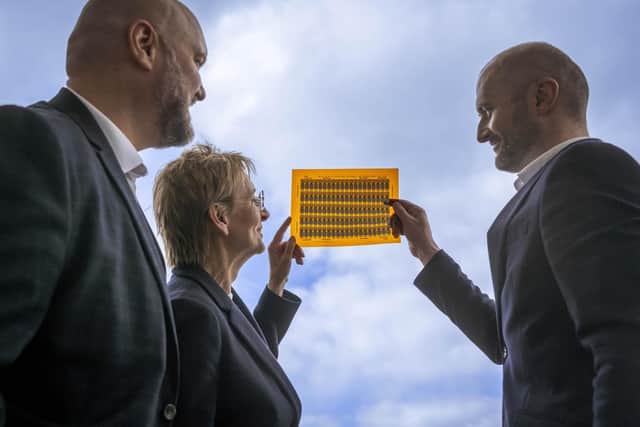 From left: Alastair McMillen of the SNIB, Niki McKenzie of Archangels, and Jean Christophe-Granier of iGii with a sheet of Gii-Sens. Picture: Phil Wilkinson.