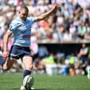 Racing's Scottish fly-half Finn Russell takes a penalty kick during the Top 14 quarter-final win over Stade Francais last weekend. (Photo by FRANCK FIFE/AFP via Getty Images)