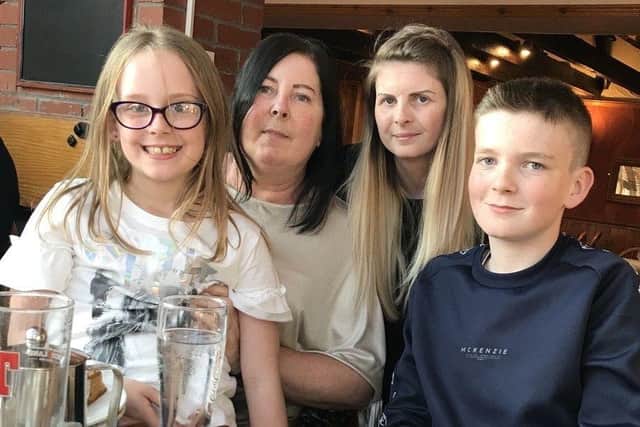 Danielle Alexander with her late mum, sister Olivia and brother Liam