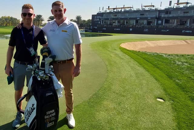Stephen Gallacher and son Jack, who is now his full-time caddie, pictured close to the spot on the Majlis Course at Emirates Golf Club where his whole family celebrated him creating history in the Hero Dubai Desert Classic a decade ago. Picture: National World