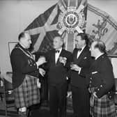 Mr Deane, Mr James Hoy, Mr E Willis and Mr M Valente at the Heather Club Burns Supper in 1963.