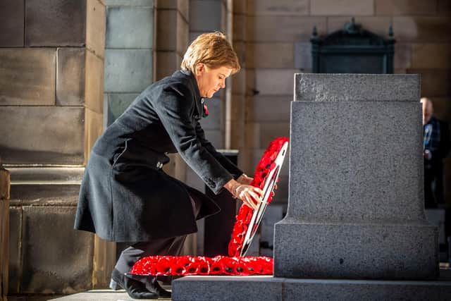 First Minister Nicola Sturgeon waa among those to lay a wreath at the Stone of Remembrance outside the City Chambers on Remembrance Sunday. Picture: Mark Owens