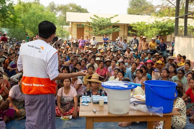 DEC charity World Vision visits earthquake-affected rural community in Myanmar to deliver water purification sachets and provide demonstrations on how to use them correctly. Picture: Nyi Thit/Fairpicture/DEC