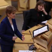 First Minister Nicola Sturgeon has said she “would welcome” the expansion of funding from the UK Government for those Scots who are forced to self-isolate with coronavirus. 
 (Photo by Fraser Bremner - Pool/Getty Images)