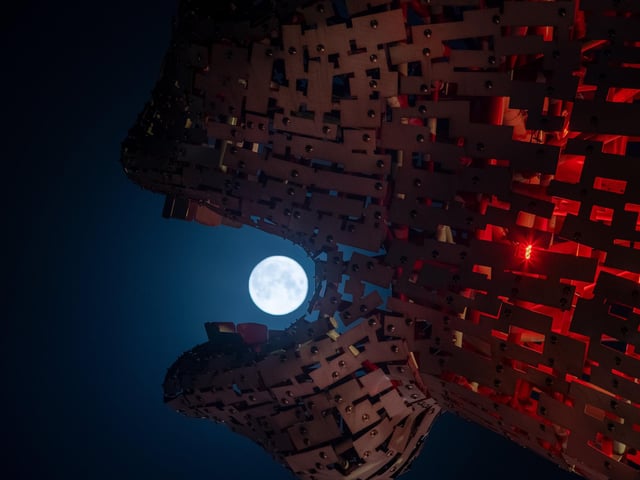 The Kelpies brought to life by the moon.