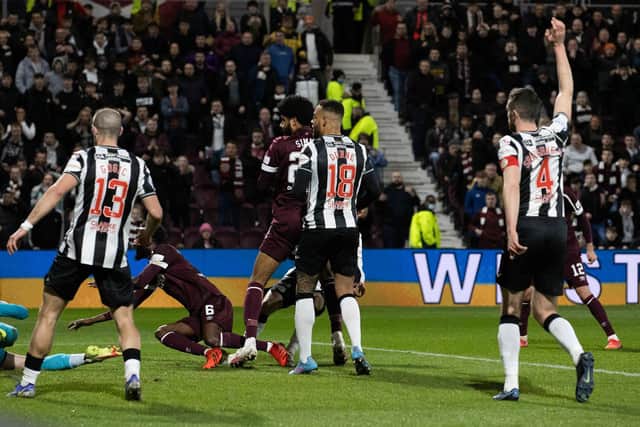 Beni Baningime opened the scoring for Hearts - his first goal for the club.