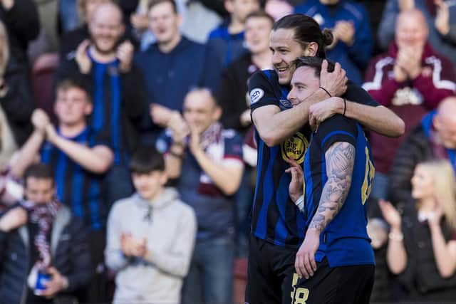 Hearts' Barrie McKay (R) celebrates making it 2-0 against Livingston with his team-mate Peter Haring.