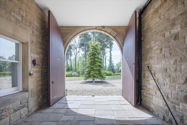Carriage arch entrance to courtyard.