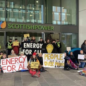Activists protesting outside the Scottish Power HQ in Glasgow.