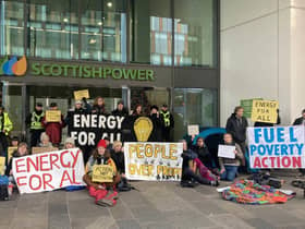 Activists protesting outside the Scottish Power HQ in Glasgow.
