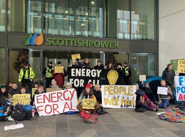 Activists protesting outside the Scottish Power HQ in Glasgow.