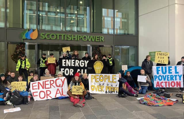 Activists protesting outside the Scottish Power HQ in Glasgow.