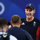 Andy Murray and Dan Evans celebrate victory for Team GB over Japan duo Kei Nishikori and Taro Daniel in the Men’s Doubles first round match at the Paris Olympics. (Photo by Clive Brunskill/Getty Images)