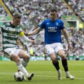 Celtic's Callum McGregor and Rangers' Tom Lawrence in action during the most recent Parkhead meeting on May 11. (Photo by Craig Foy / SNS Group)