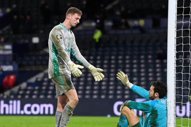 Celtic 'keeper Conor Hazard sympathises with Hearts opposite number, and former club mate, Craig Gordon (Photo by Rob Casey / SNS Group)
