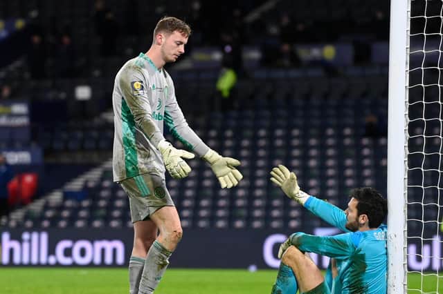 Celtic 'keeper Conor Hazard sympathises with Hearts opposite number, and former club mate, Craig Gordon (Photo by Rob Casey / SNS Group)