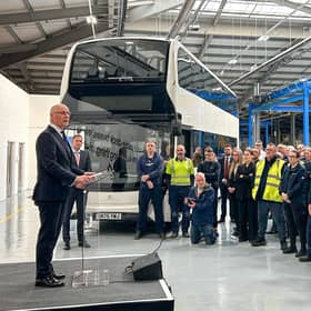 First Minister John Swinney speaking to Alexander Dennis team members.
