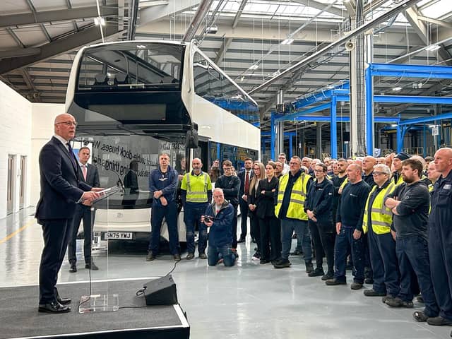 First Minister John Swinney speaking to Alexander Dennis team members.