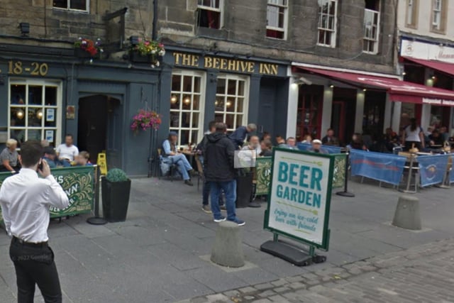 The Beehive Inn in Edinburgh's Grassmarket is said to be haunted by several ghosts, one of which is the apparition of a young woman who appears in various rooms.