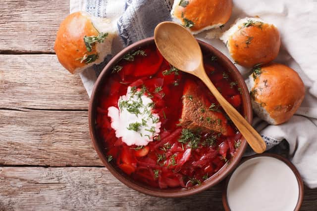 Ukrainian borsch soup and garlic buns on the table. Pic:Getty