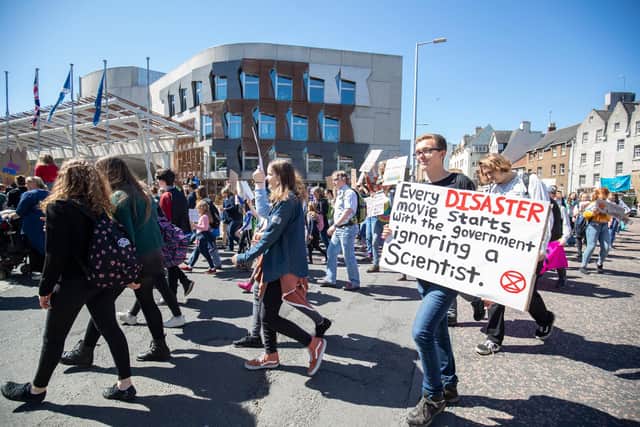 Students take part in the Scottish Youth Climate Strike in Holyrood, Edinburgh, to demand urgent action to tackle global warming in May 2019 (Picture: Jane Barlow/PA)