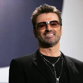 George Michael poses at the "George Michael: A Different Story" Photocall during the 55th annual Berlinale International Film Festival in 2005. Photo: Sean Gallup/Getty Images.