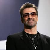 George Michael poses at the "George Michael: A Different Story" Photocall during the 55th annual Berlinale International Film Festival in 2005. Photo: Sean Gallup/Getty Images.