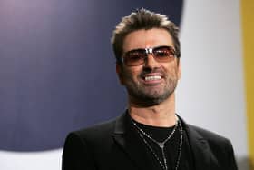 George Michael poses at the "George Michael: A Different Story" Photocall during the 55th annual Berlinale International Film Festival in 2005. Photo: Sean Gallup/Getty Images.