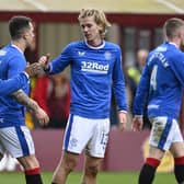 Todd Cantwell celebrates with Fashion Sakala after putting Rangers 3-2 ahead at Motherwell. (Photo by Rob Casey / SNS Group)