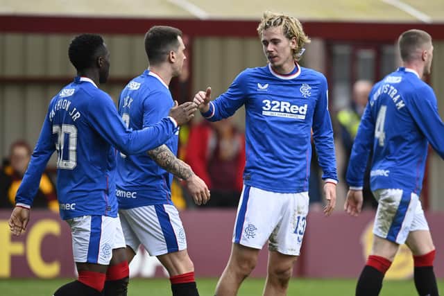 Todd Cantwell celebrates with Fashion Sakala after putting Rangers 3-2 ahead at Motherwell. (Photo by Rob Casey / SNS Group)