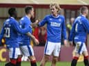 Todd Cantwell celebrates with Fashion Sakala after putting Rangers 3-2 ahead at Motherwell. (Photo by Rob Casey / SNS Group)