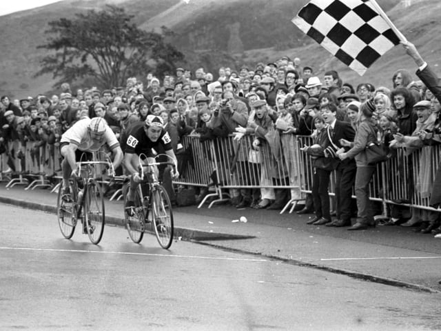 New Zealander Bruce Biddle and Australian Ray Bilney race towards the chequered flag at the finish of the 102 miles cycling road race during the Commonwealth Games in Edinburgh in July 1970. Biddle won the race.
