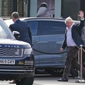 Former Prime Minister Boris Johnson arrives at Gatwick Airport in London, after travelling on a flight from the Caribbean