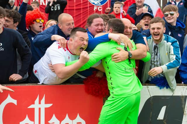 Spartans goalkeeper Blair Carswelll celebrates with fans after the team's play-off victory against Albion Rovers (Picture: Sammy Turner/SNS Group)