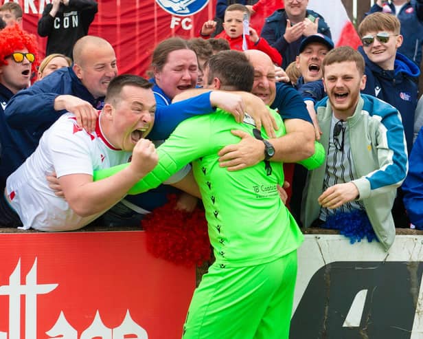 Spartans goalkeeper Blair Carswelll celebrates with fans after the team's play-off victory against Albion Rovers (Picture: Sammy Turner/SNS Group)