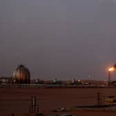 A flame sends smoke billowing into the sky at a Saudi Aramco oil installation in Al-Khurais, Saudi Arabia (Picture: Marwan Naamani/AFP via Getty Images)