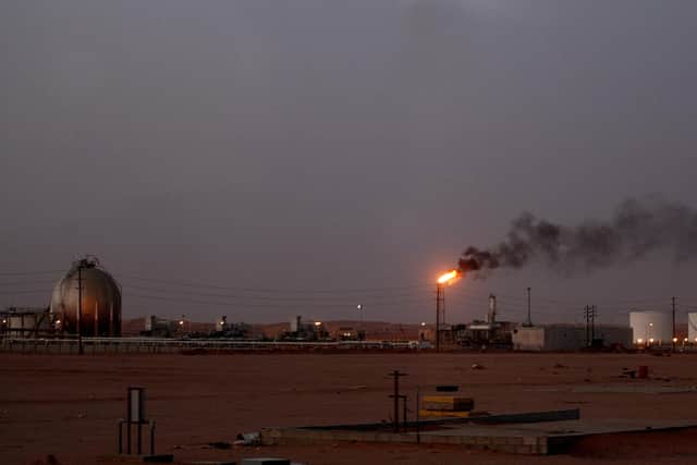 A flame sends smoke billowing into the sky at a Saudi Aramco oil installation in Al-Khurais, Saudi Arabia (Picture: Marwan Naamani/AFP via Getty Images)