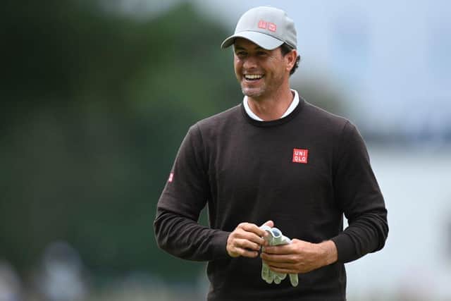 Adam Scott smiles after picking up an unexpected birdie at the 15th hole during the first round of the BMW PGA Championship at Wentworth. Picture: Picture: Glyn Kirk/AFP via Getty Images.