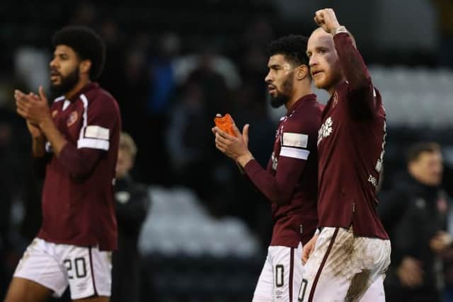 Liam Boyce (R) celebrates with Hearts fans at full time during a cinch Premiership match between St. Mirren and Hearts of Midlothian. (Photo by Alan Harvey / SNS Group)