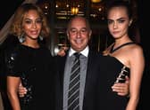 Beyonce Knowles, Sir Philip Green and Cara Delevingne at the Topshop Topman New York City flagship opening dinner in 2014 (Photo: Dimitrios Kambouris/Getty Images)