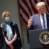 Donald Trump has resisted calls to set an example to the American people by wearing a face mask, which experts say helps slow the spread of the Covid-19 coronavirus (Picture: Mandel Ngan/AFP via Getty Images)
