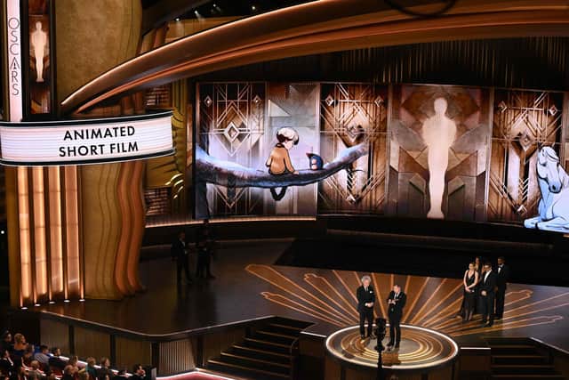 Charlie Mackesy and Producer Matthew Freud accept the Oscar for Best Animated Short Film for 'The Boy, the Mole, the Fox and the Horse' onstage during the 95th Annual Academy Awards. Image: Getty 