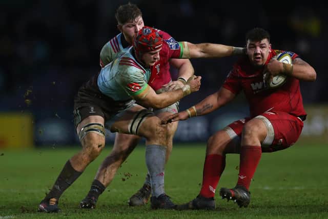 Javan Sebastian, right, in action for Scarlets. The prop, who spent a season at Ayr, qualifies for Scotland through his father.