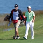 Collin Morikawa and caddie J.J. Jakovac pictured during the third round of the Hero World Challenge at Albany Golf Course in Nassau, Bahamas. Picture: Mike Ehrmann/Getty Images.