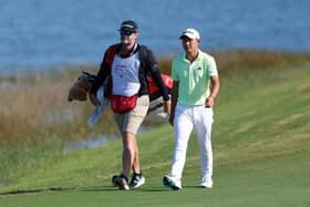 Collin Morikawa and caddie J.J. Jakovac pictured during the third round of the Hero World Challenge at Albany Golf Course in Nassau, Bahamas. Picture: Mike Ehrmann/Getty Images.