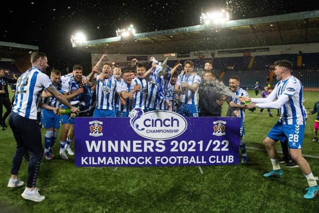 The Kilmarnock players celebrate with the league trophy. (Photo by Craig Foy / SNS Group)