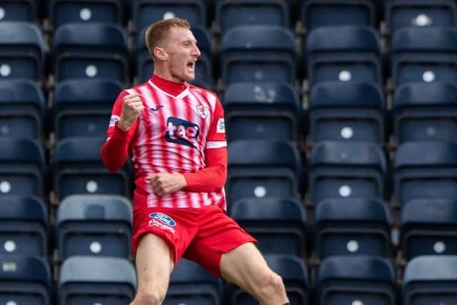 Raith's Liam Dick  celebrates making it 1-0 during a cinch Championship match between Kilmarnock and Raith Rovers at Rugby Park, on October 02, 2021, in Kilmarnock, Scotland. (Photo by Craig Brown / SNS Group)