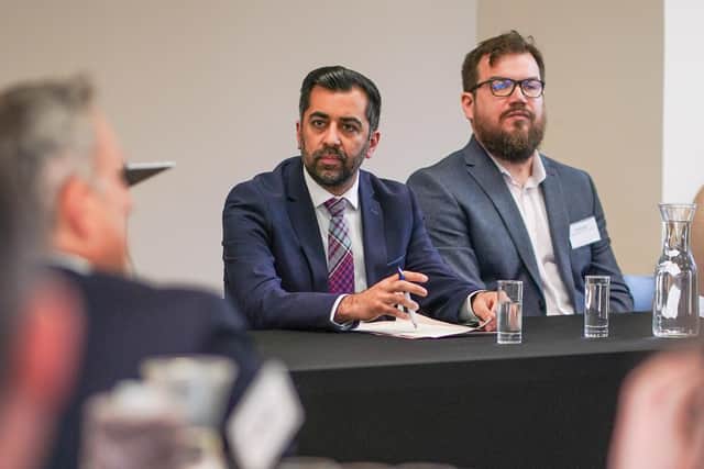 First Minister Humza Yousaf (left) during an anti-poverty summit at Dovecot Studios, Edinburgh